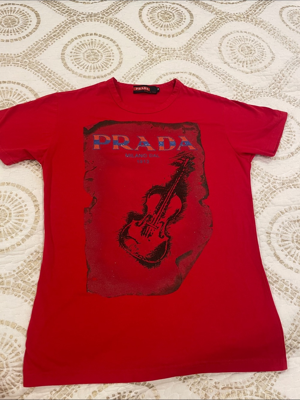 Prada Red Graphic Logo Tee with Violin Motif